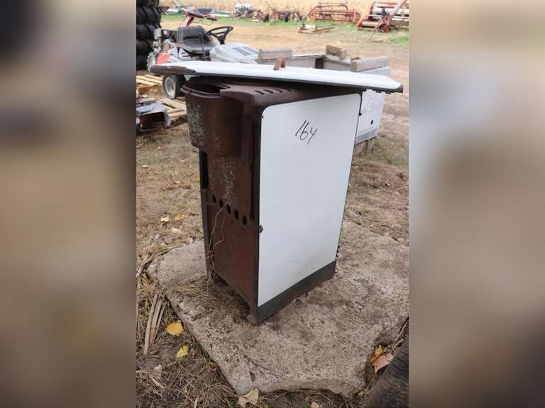 Metal upright stove Adam Marshall Land & Auction, LLC