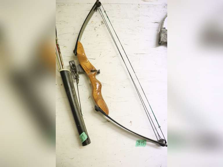 2 bows and arrows Adam Marshall Land & Auction, LLC