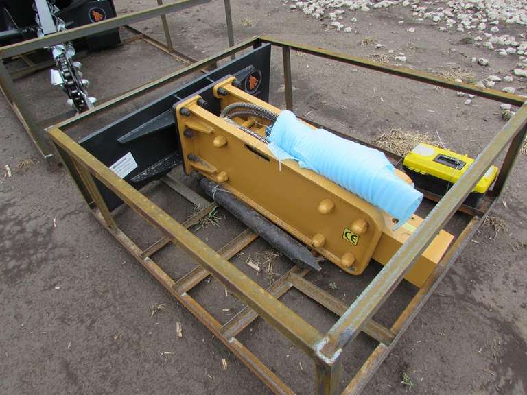 Unused Wolverine concrete breaker for skid steer Adam Marshall Land