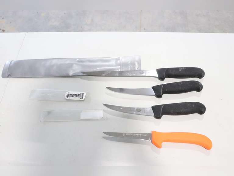 4 Knives, 3 are Victorinox, 1 is Dexter Adam Marshall Land & Auction, LLC