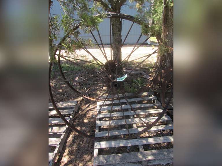 Two 54" Metal Rake Wheels Adam Marshall Land & Auction, LLC
