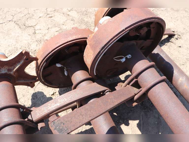 4 trailer house axles with bolts Adam Marshall Land & Auction, LLC