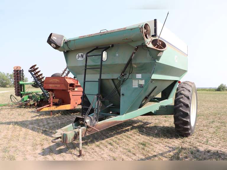 J & M Auger Wagon Adam Marshall Land & Auction, LLC