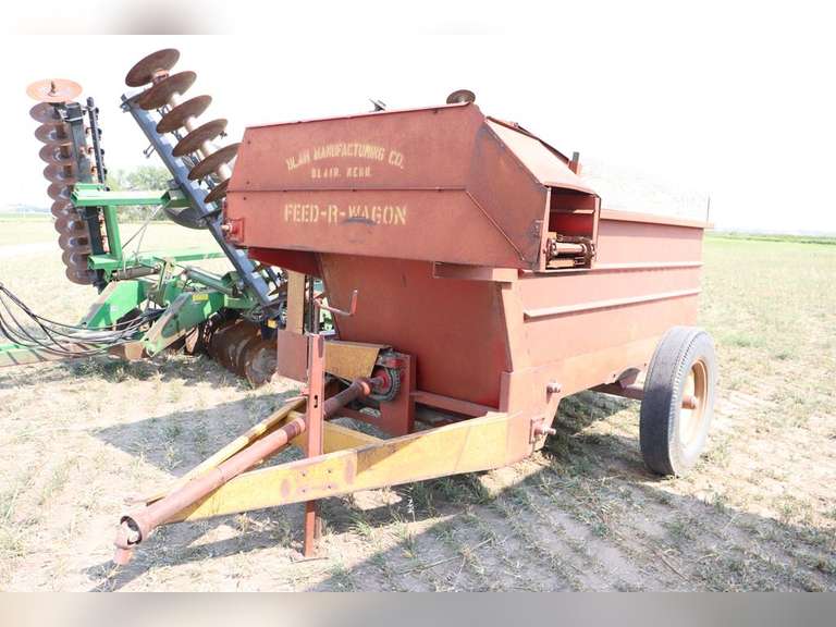 Kelly Ryan Feed Wagon Adam Marshall Land & Auction, LLC
