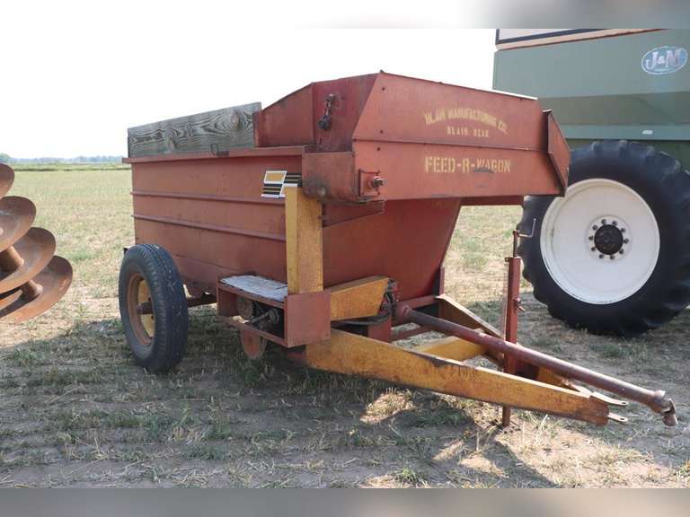 Kelly Ryan Feed Wagon Adam Marshall Land & Auction, LLC