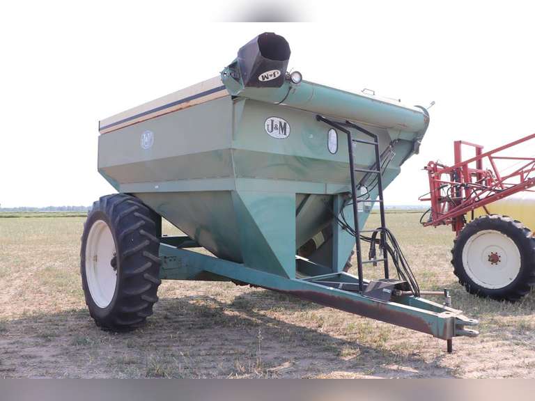 J & M Auger Wagon Adam Marshall Land & Auction, LLC