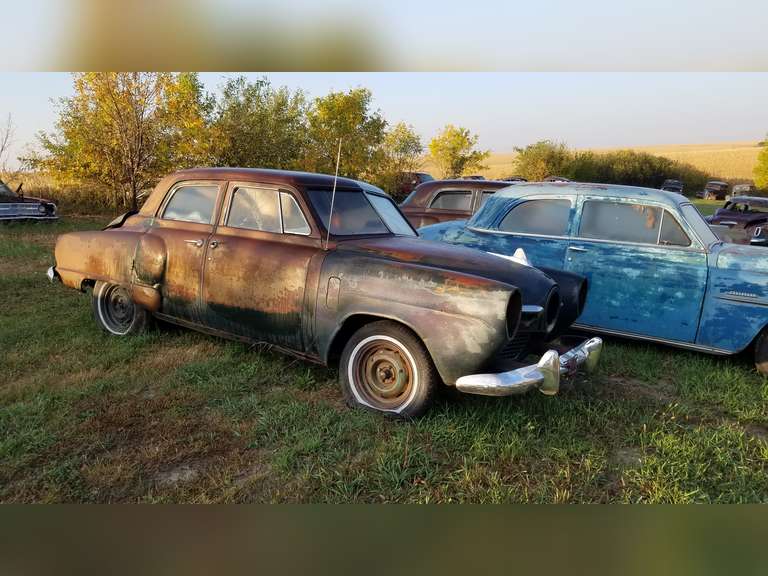 (Amherst, NE) 195051 Studabaker Black Champion, 4 Door, w/ Bumper