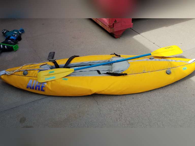 Canvas Kayak with Oar Adam Marshall Land & Auction, LLC