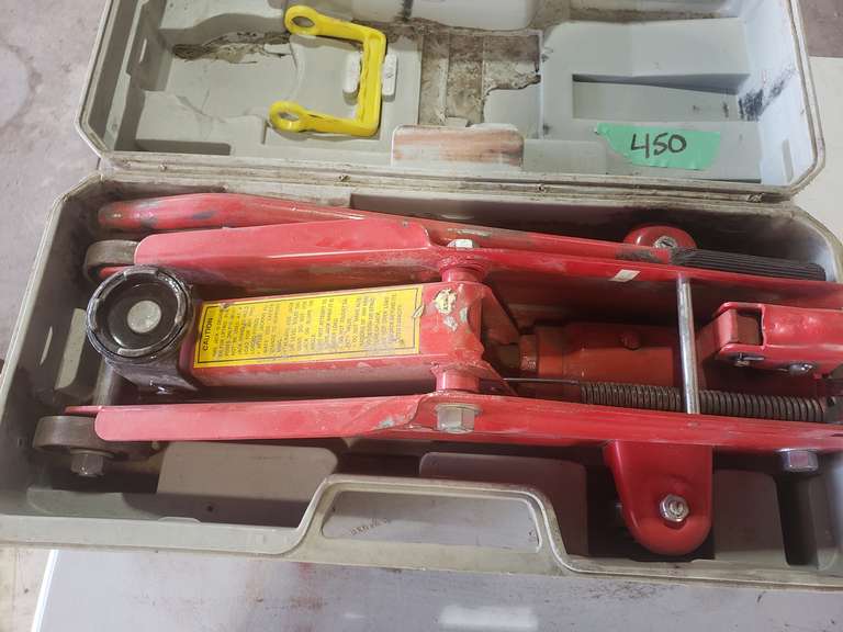 2 Ton Floor Jack in case Adam Marshall Land & Auction, LLC
