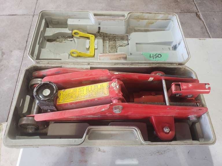 2 Ton Floor Jack in case Adam Marshall Land & Auction, LLC