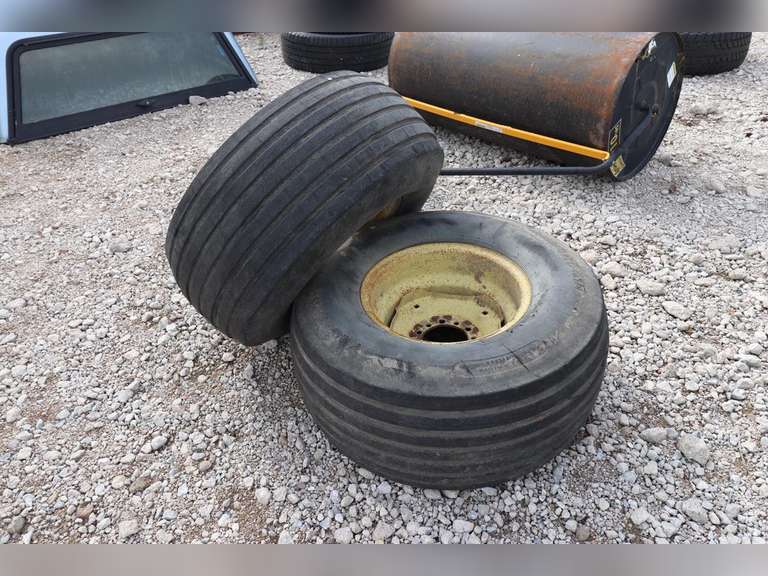Round Baler tires and rims, 3913.515 NHS Adam Marshall Land & Auction, LLC