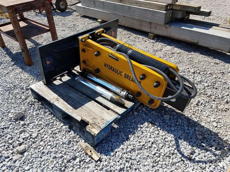 Unused Wolverine concrete breaker for skid steer Adam Marshall Land