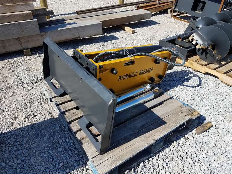 Unused Wolverine concrete breaker for skid steer Adam Marshall Land