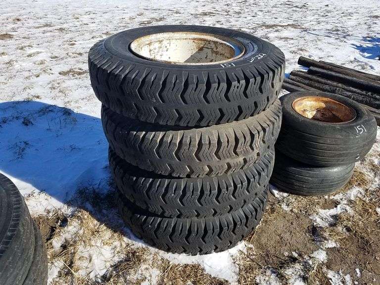 (4) 10.0020 Truck Tires & Rims Adam Marshall Land & Auction, LLC