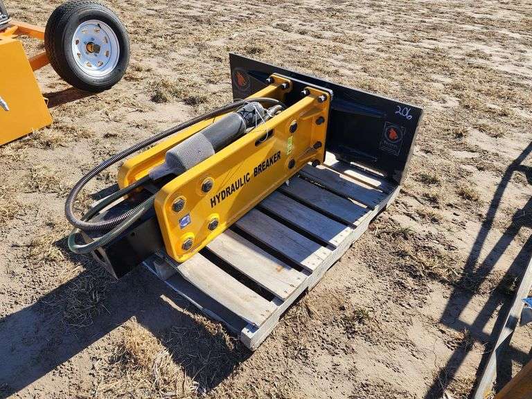 Unused Wolverine ZW750 concrete breaker for skid steer Adam Marshall