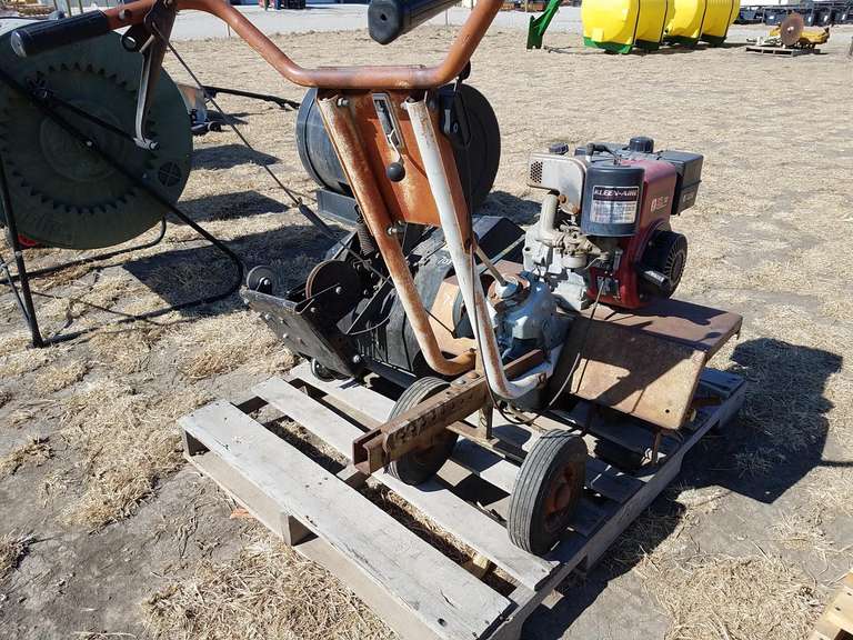 Rototiller and pull behind tiller Adam Marshall Land & Auction, LLC