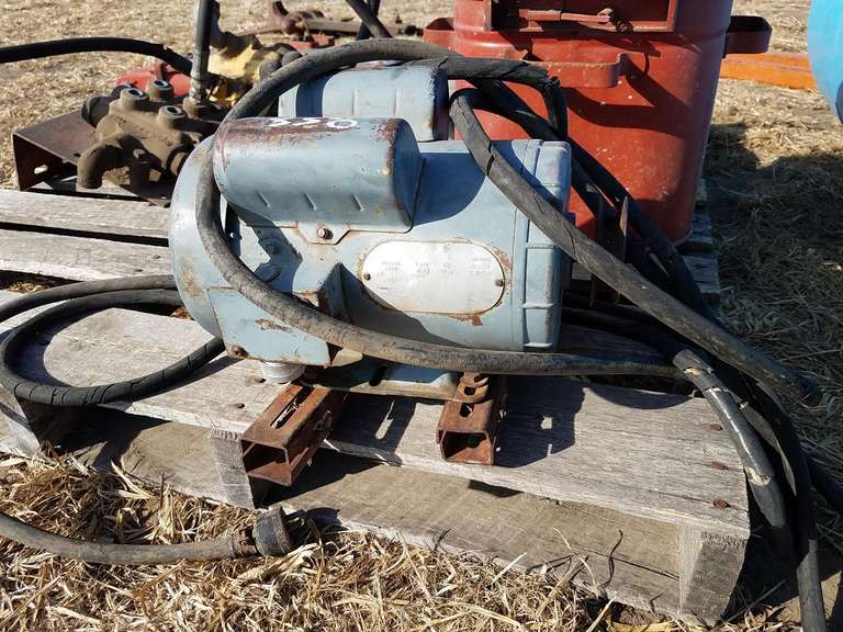 Electric motor, works Adam Marshall Land & Auction, LLC