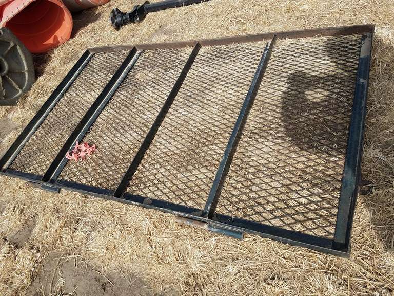 Wire fold down ramp for trailer Adam Marshall Land & Auction, LLC