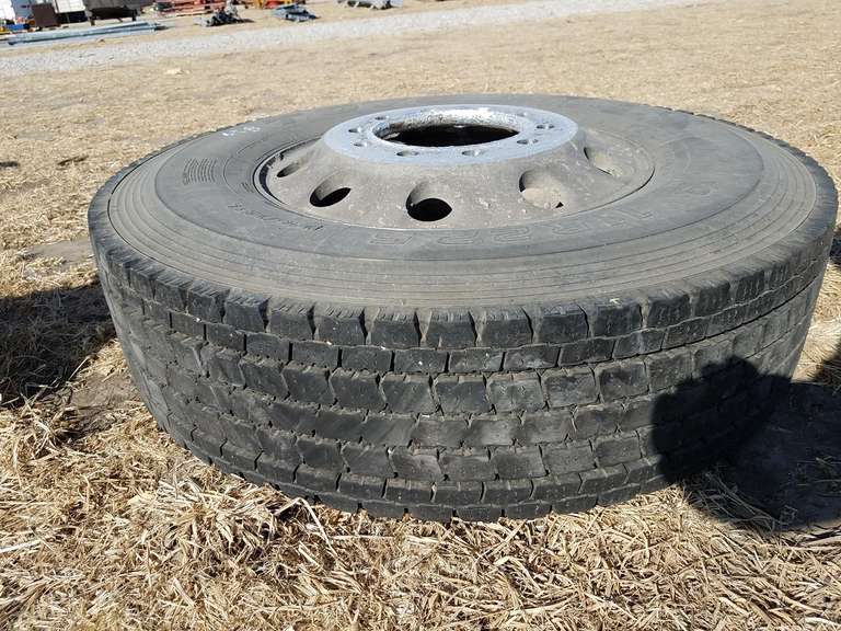 Toyo 11R22.5 tire & rim Adam Marshall Land & Auction, LLC