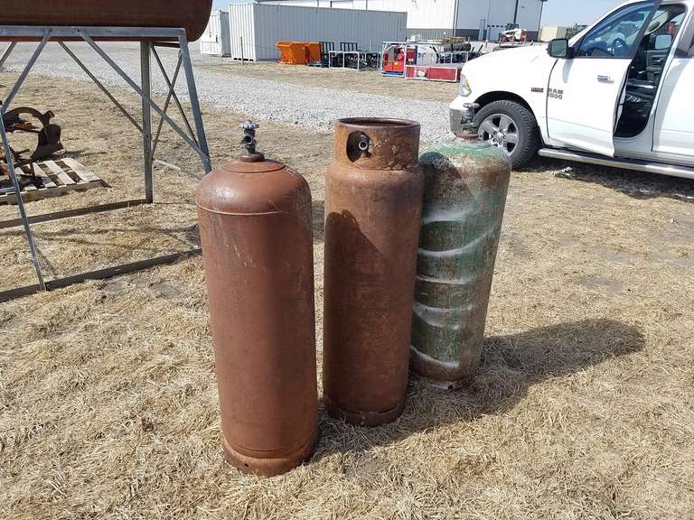 (3) 100lb Propane Bottles Adam Marshall Land & Auction, LLC