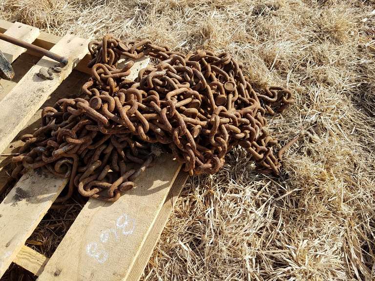 Tractor Tire chains Adam Marshall Land & Auction, LLC