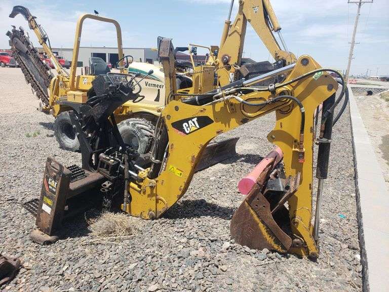 Caterpillar BH160 Skidsteer Backhoe Attachment Adam Marshall Land