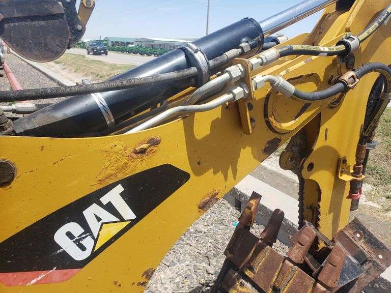 Caterpillar BH160 Skidsteer Backhoe Attachment Adam Marshall Land