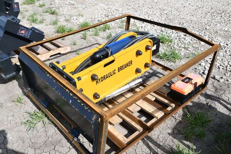 Unused Wolverine ZW750 concrete breaker for skid steer Adam Marshall