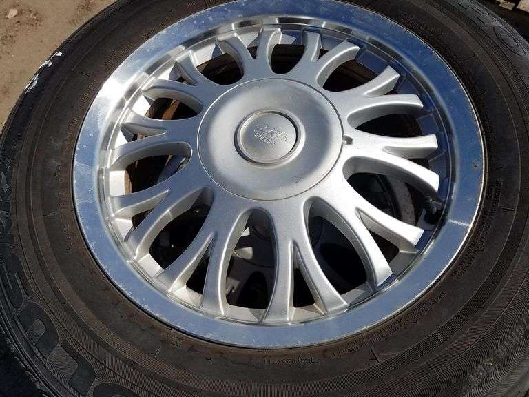 (4) Tires & Rims P215/70R16 - Adam Marshall Land & Auction, LLC