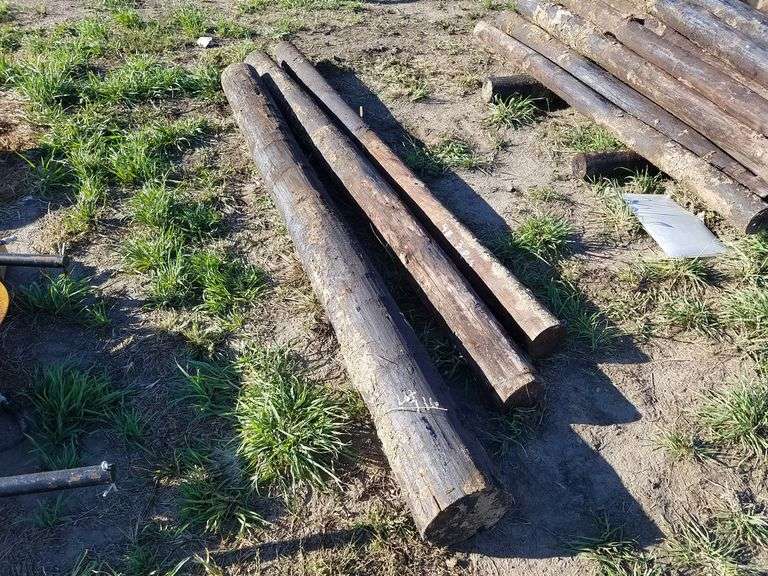(3) 8FT Wood Fence Posts, 5.5" & 8.5" Adam Marshall Land & Auction, LLC