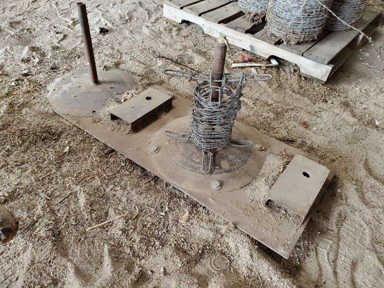 Skidsteer barb wire unroller - Adam Marshall Land & Auction, LLC