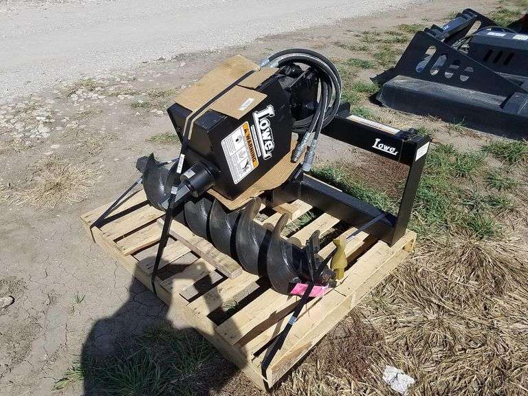Unused Lowe Post Hole Digger Adam Marshall Land & Auction, LLC