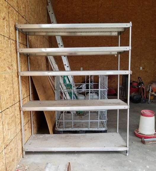Stainless Steel shelving unit Adam Marshall Land & Auction, LLC