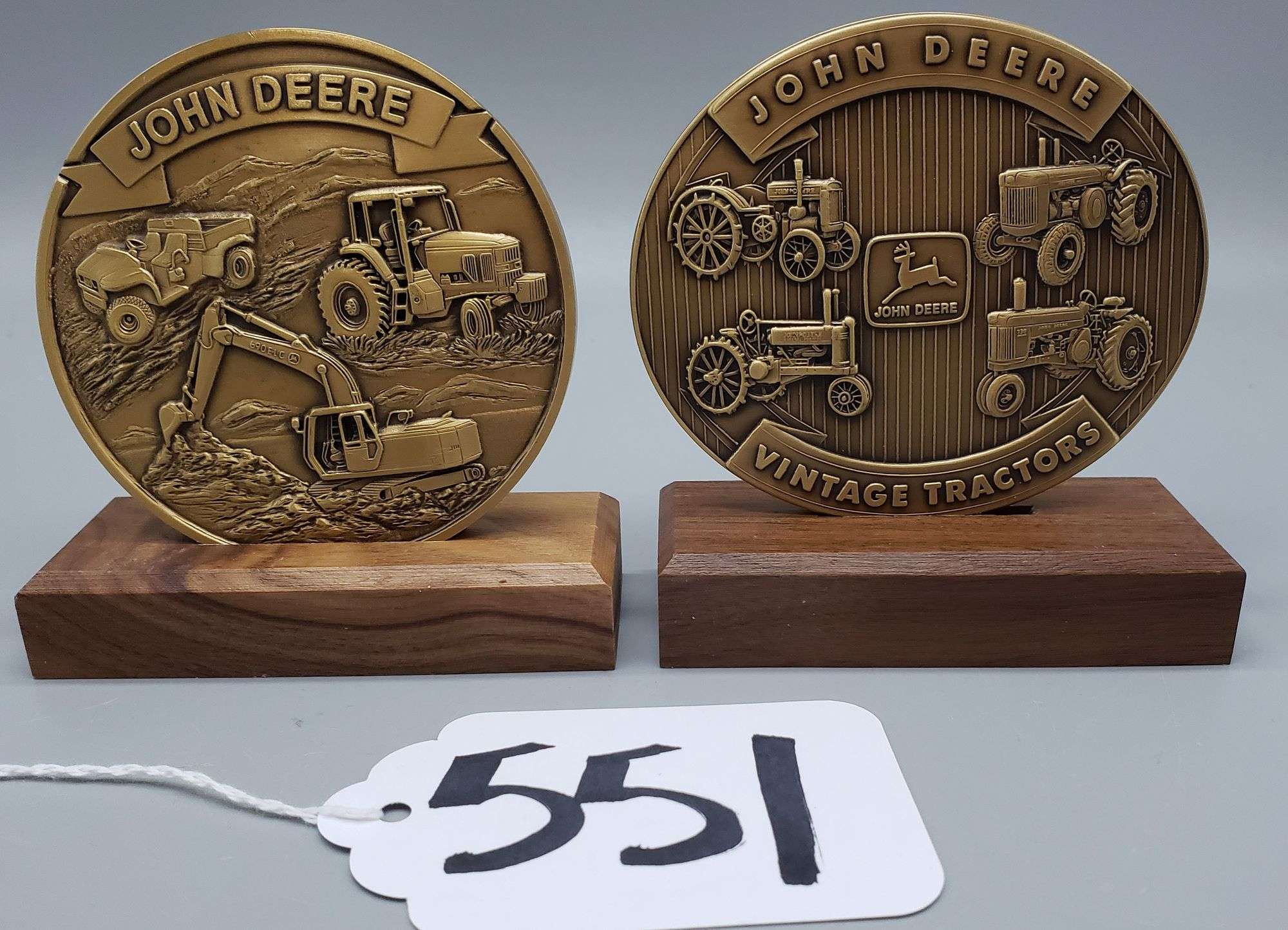 2) John Deere Large Brass Calendar Medals and stands. 1993 and 1994 - Adam  Marshall Land & Auction, LLC