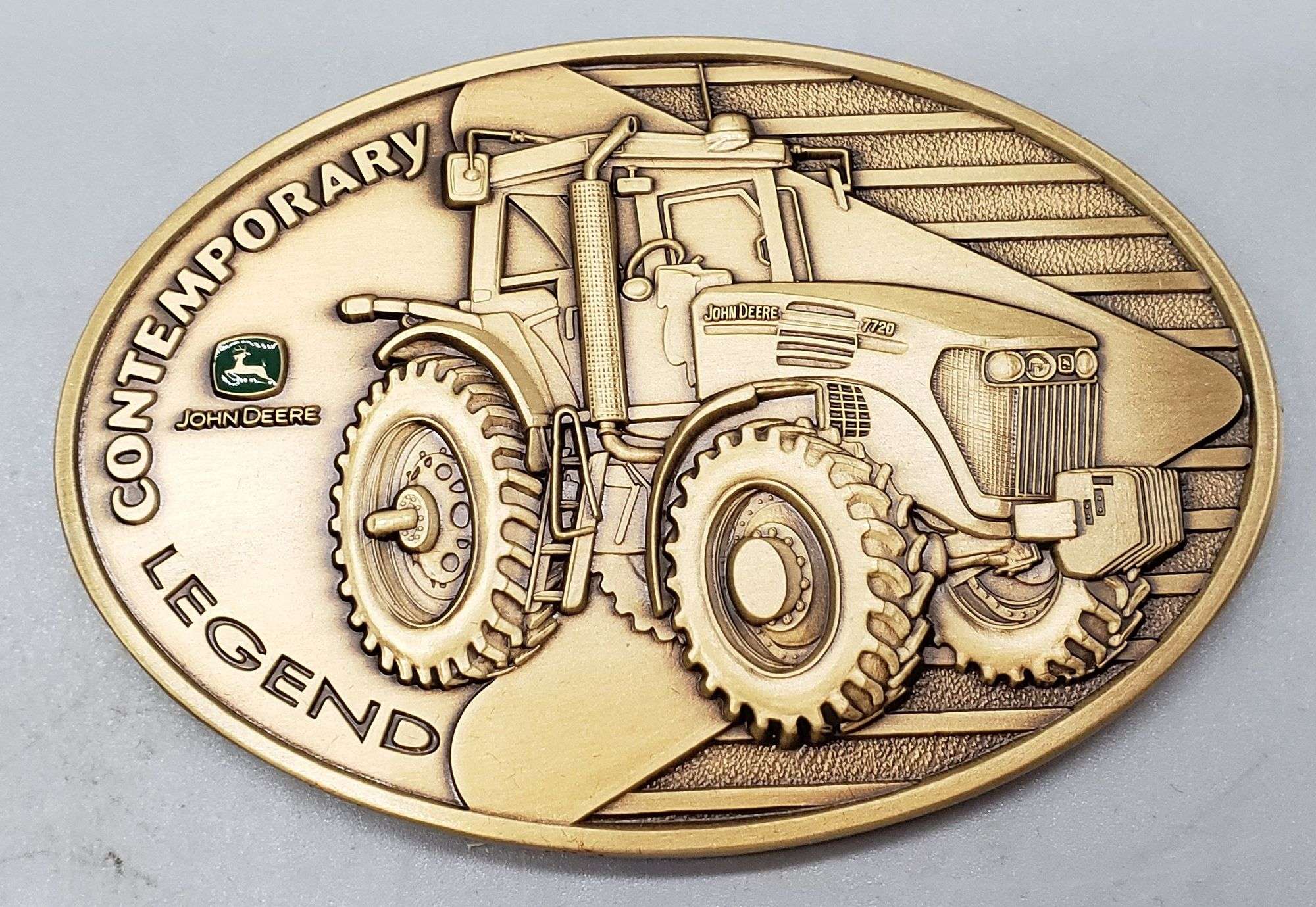 2) John Deere Brass Calendar Medals, stands, certificates and boxes. 2006  and 2007 - Adam Marshall Land & Auction, LLC