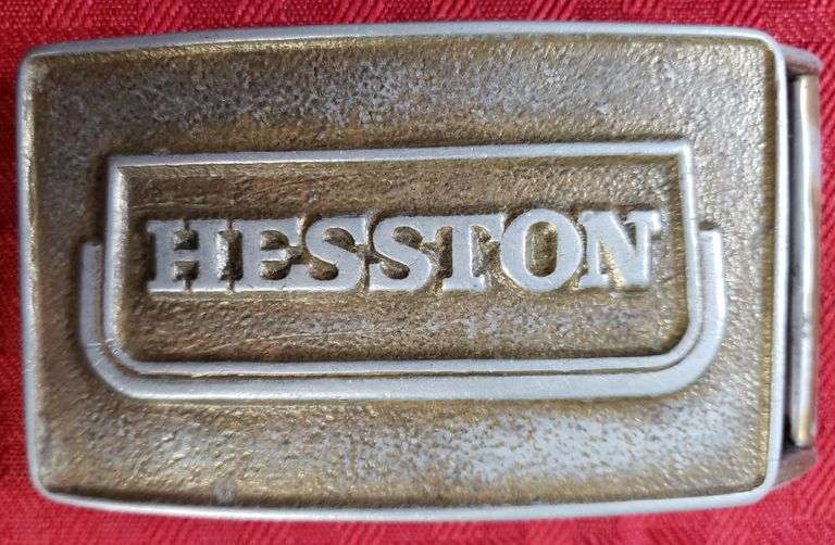 1974 Hesston belt buckle First Edition Adam Marshall Land & Auction, LLC