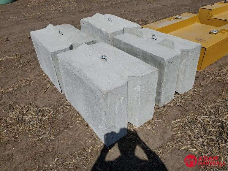 (4) 3FT Wide Cement Blocks w/ Hooks Adam Marshall Land & Auction, LLC