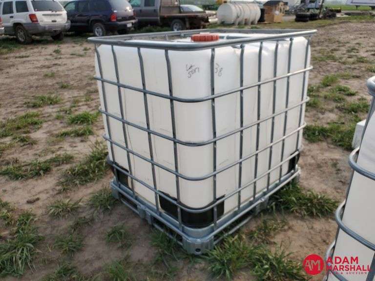 275 Gallon Totes w/ Cage Adam Marshall Land & Auction, LLC