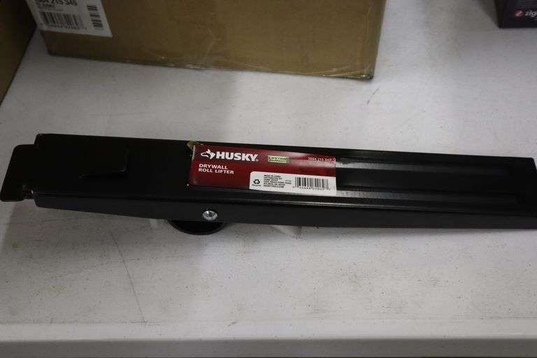 Case of 8 Husky Drywall roll lifter Matthews Auctioneers