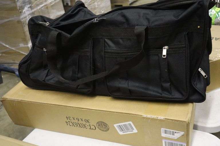 Large rolling duffle bag Has been used Matthews Auctioneers