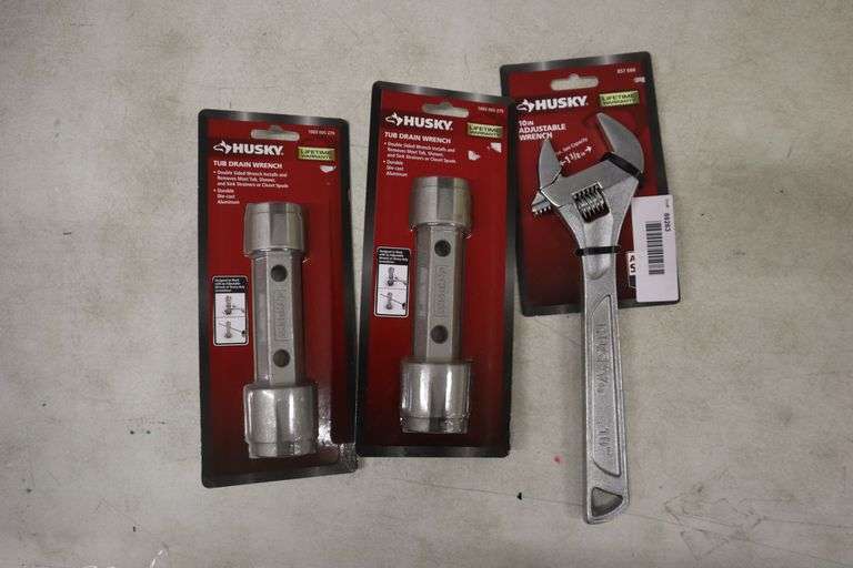 (2) Husky tub drain wrench and (1) Husky 10" Adjustable Wrench