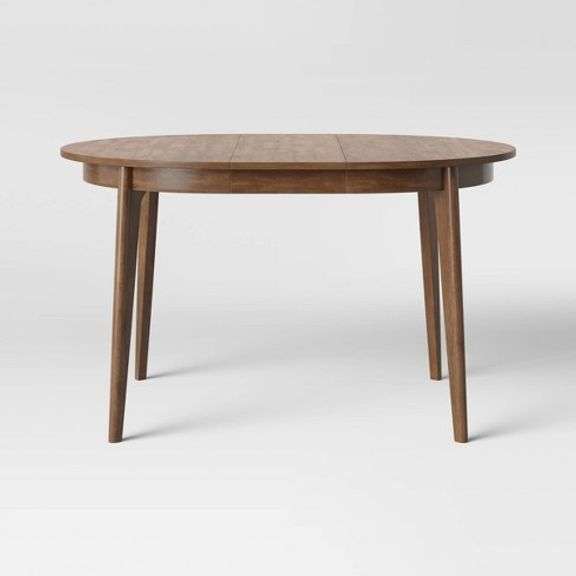 Project 62 Astrid midcentury round dining table Matthews Auctioneers