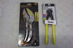 Poly pipe pinch clamp tool and Fiskars anvil pruner