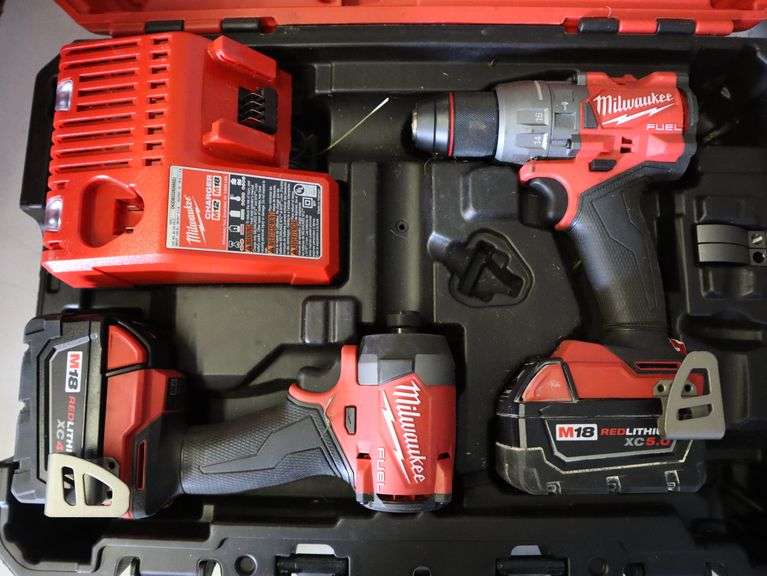 Milwaukee M18 Fuel Drill and Impact Kit with 4 AH and 5 AH Batteries Matthews Auctioneers