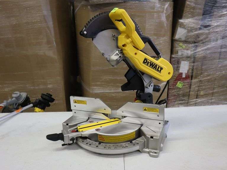 Dewalt 12" double bevel compound miter saw Has been used. Missing