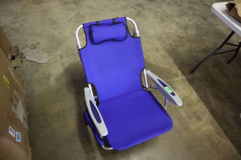 Folding beach chair Matthews Auctioneers
