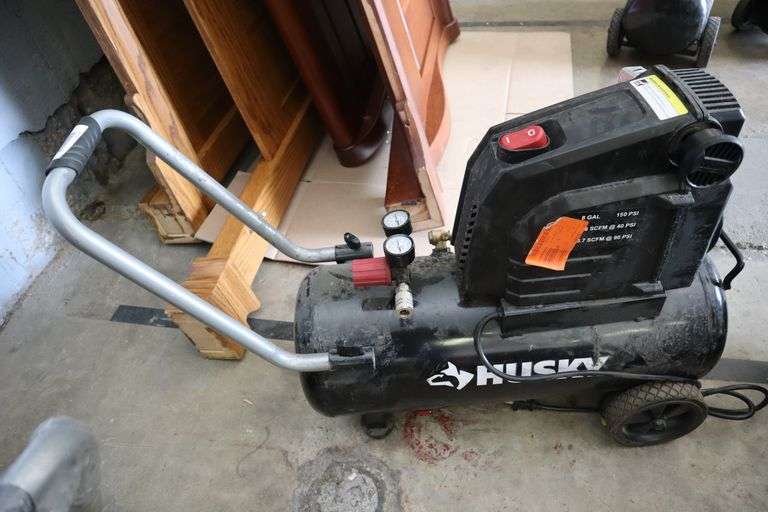 Husky 8 gal air compressor Tested and working. Matthews Auctioneers