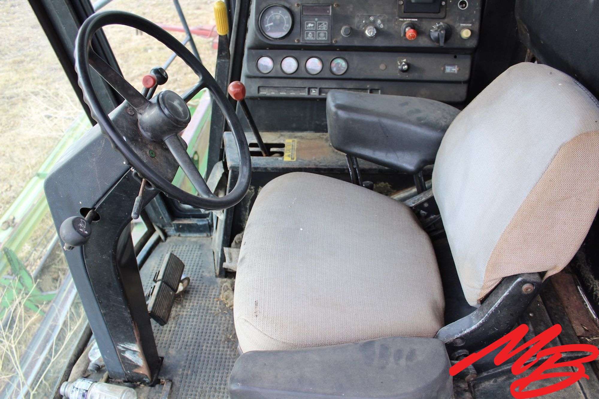 John Deere 7720 Turbo Diesel Combine, 4588 hrs - Musser Bros Inc