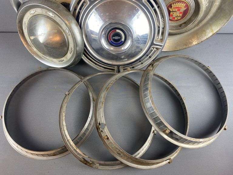 8 piece group of assorted hubcaps and trim rings Matthew Bullock
