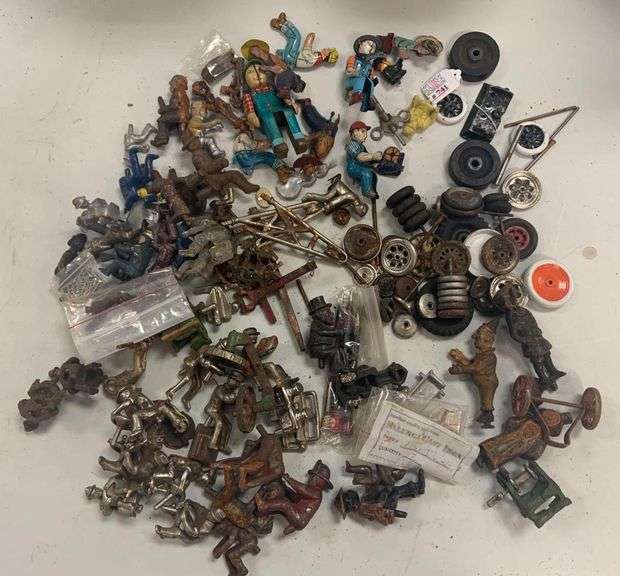 Group of Cast Iron and Tin toy parts Matthew Bullock Auctioneers